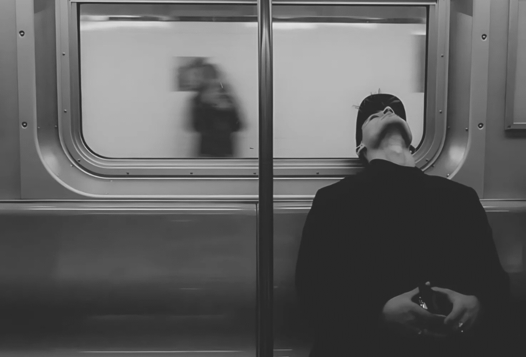 Depressed man in train